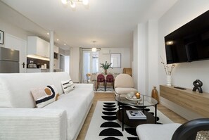 Apartamento Deluxe | Zona de estar