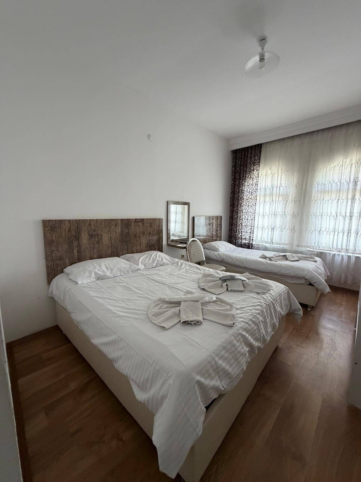 Habitación triple, vistas a la ciudad