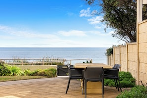 Outdoor dining - Villa Bliss on the Esplanade—Slow Days by the Sea (Henley Beach South)