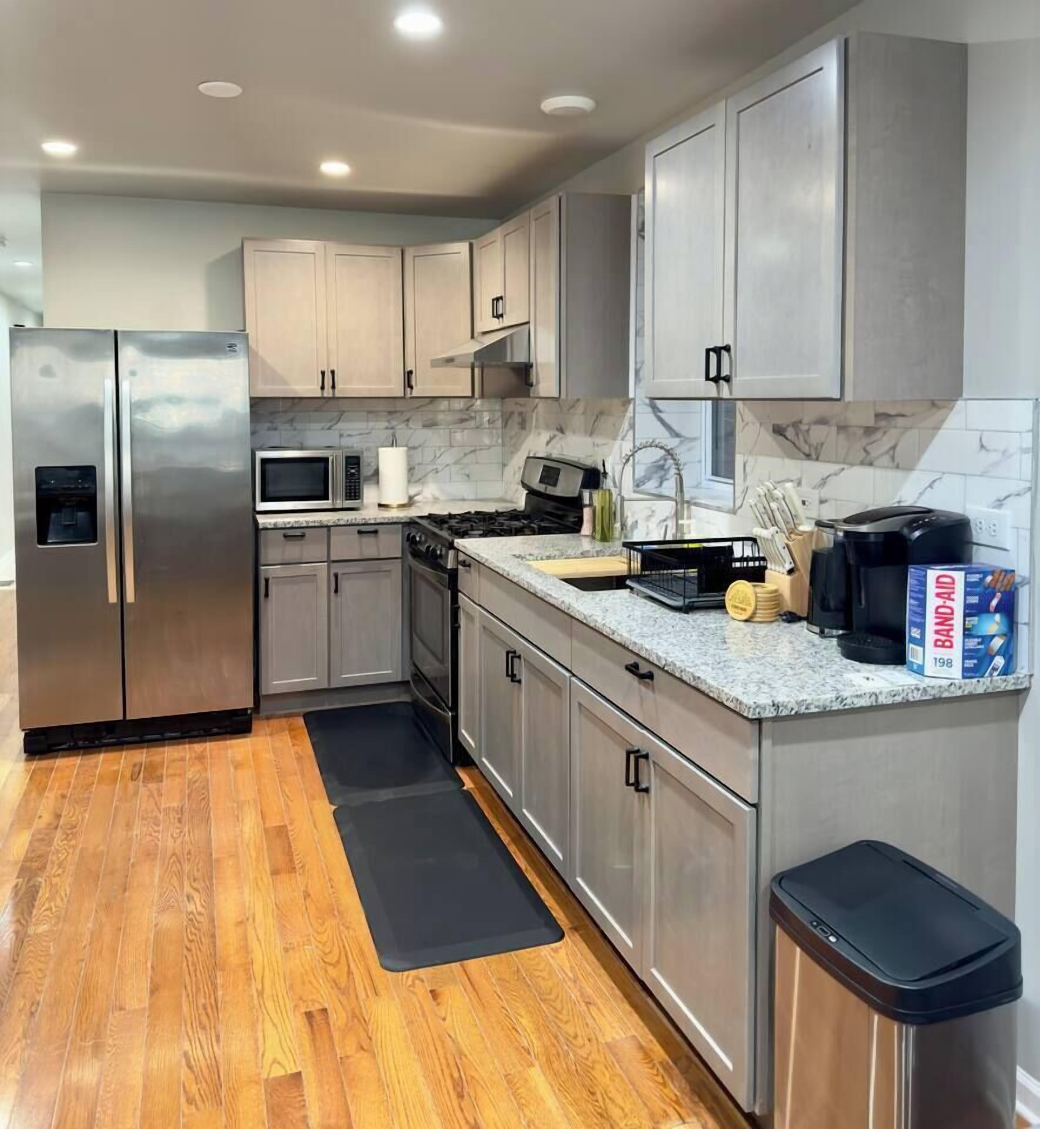 Coffee/tea maker, fridge, microwave, oven