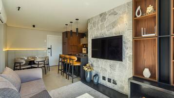 Basic Apartment | Living area | 40-inch TV with digital channels