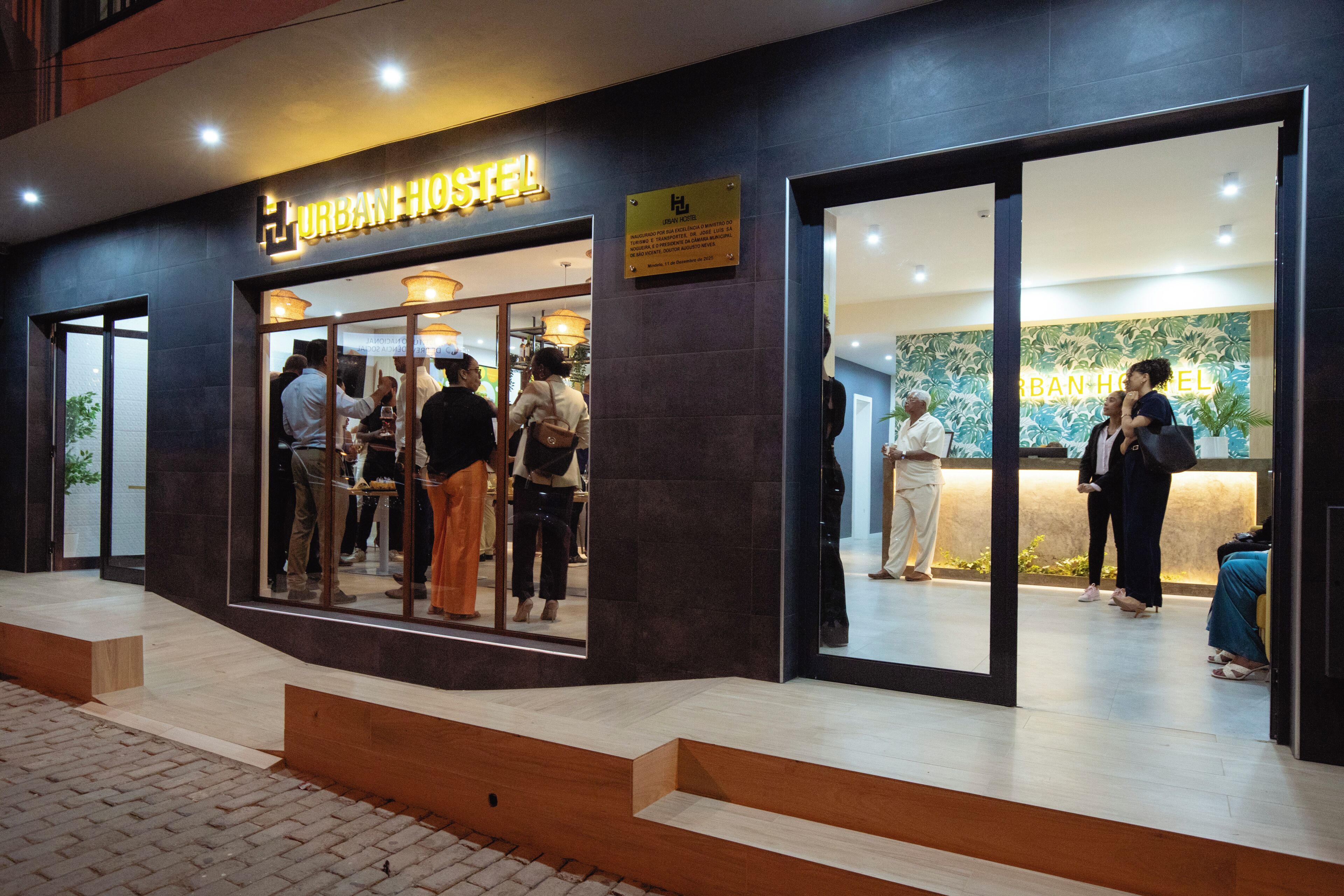 A hostel with a reception desk and a sign indicating it is a hostel.