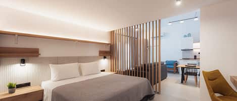 A modern bedroom with a large bed, bedside tables, a desk, and a chair.