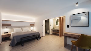 A modern bedroom with a bed, bedside tables, a desk, and a chair. - Chalkidiki Peaceful Retreat With Private Parking (Sithonia)