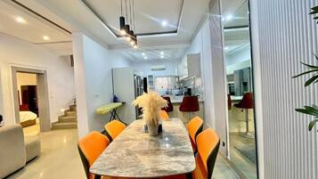 Deluxe Apartment, Balcony, City View | Dining