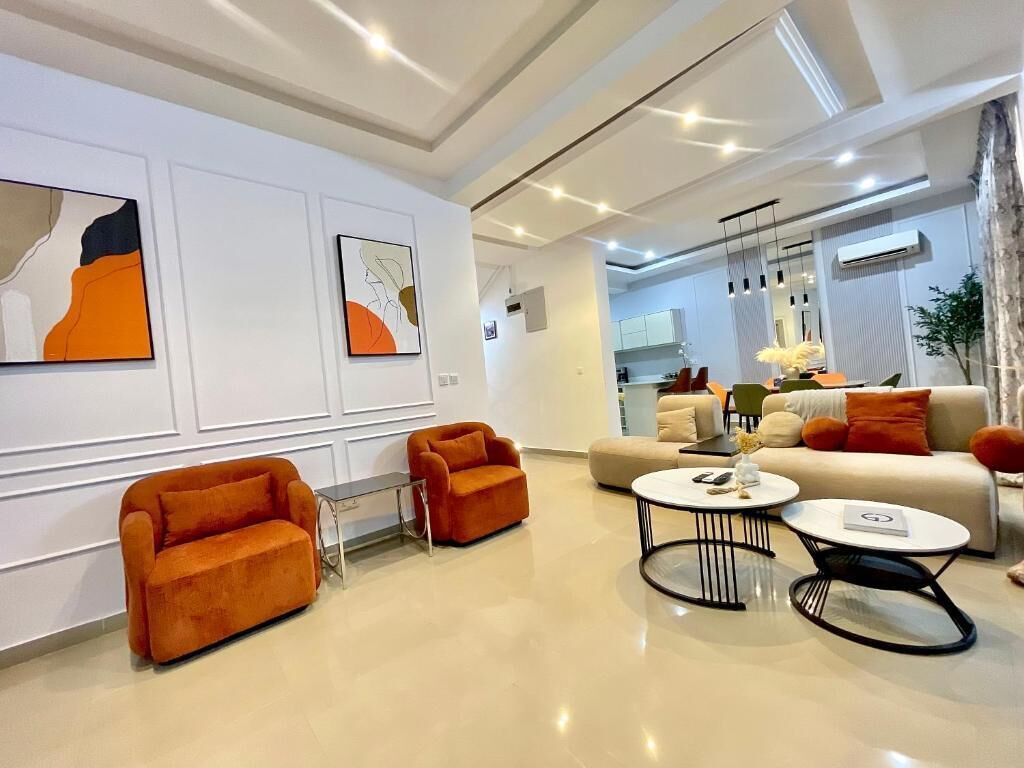 Deluxe-Apartment, Balkon, Stadtblick | Wohnbereich