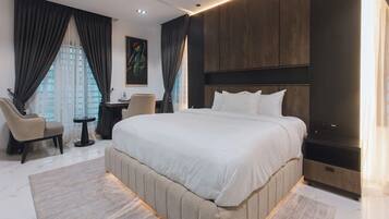 Standard Apartment, Balcony, City View | In-room safe, desk, laptop workspace, blackout drapes