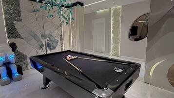 Deluxe Apartment, Balcony, City View | Game room