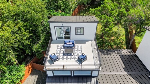 Modern Stunner Walkable to Lake Travis + Views!