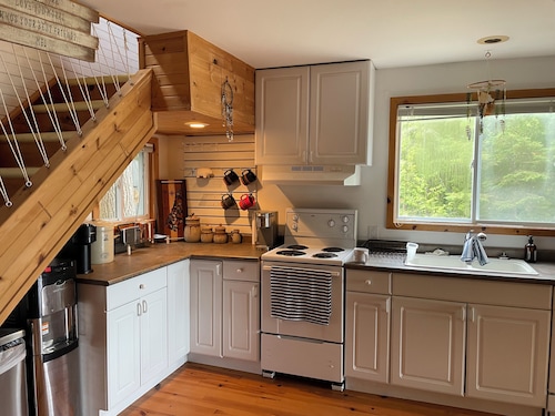 Welcome to The Cedars.
Beautifully maintained waterfront quaint log cabin
