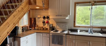Welcome to The Cedars.
Beautifully maintained waterfront quaint log cabin