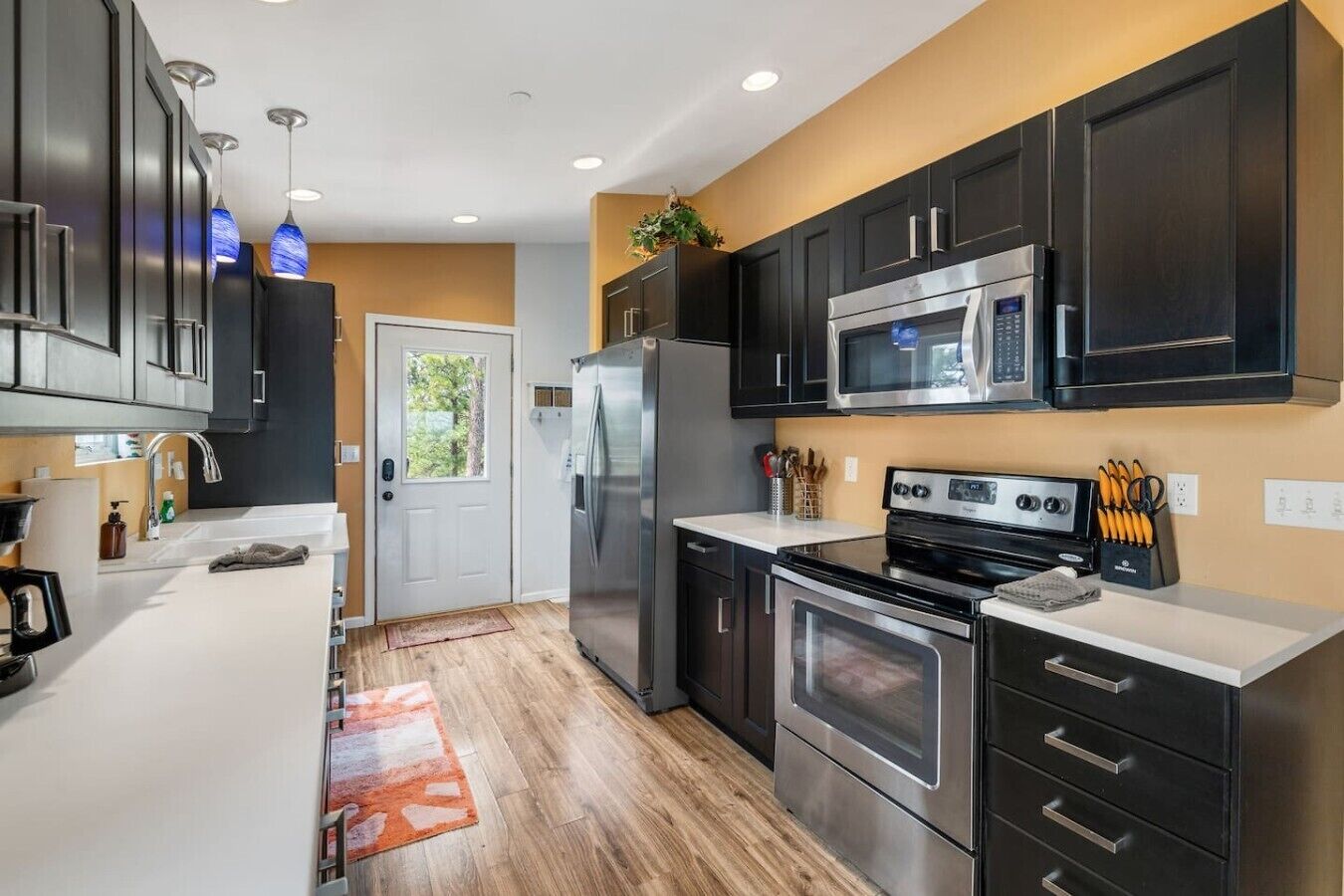 Coffee/tea maker, fridge, microwave, oven