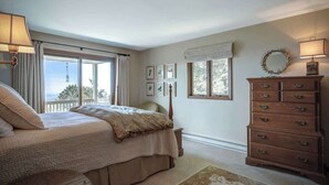 A bedroom with a bed, a dresser, and a window with a view. - Blissful Vista has breathtaking gorge views, seclu (Blowing Rock)
