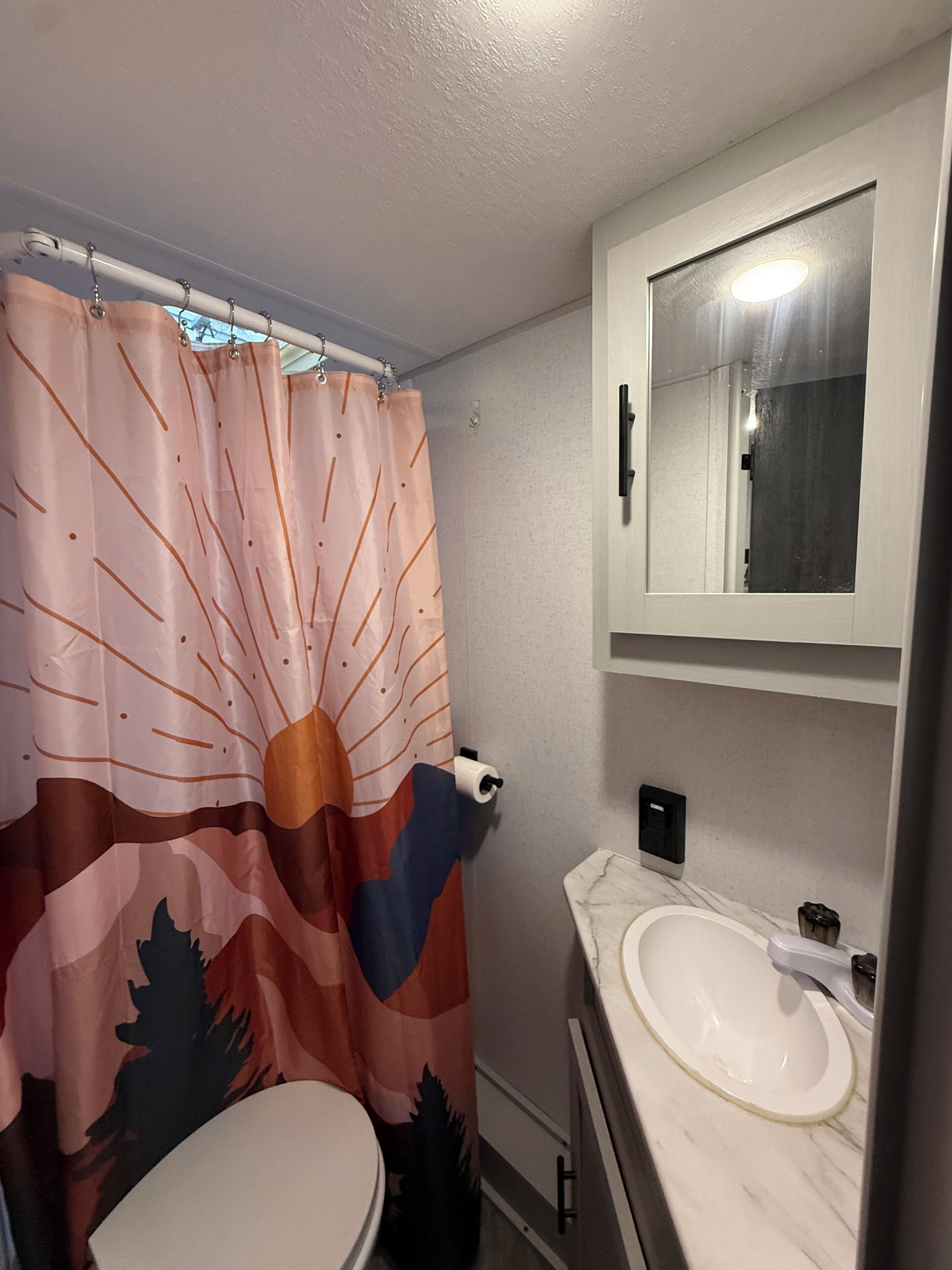 Shower, towels, soap, toilet paper