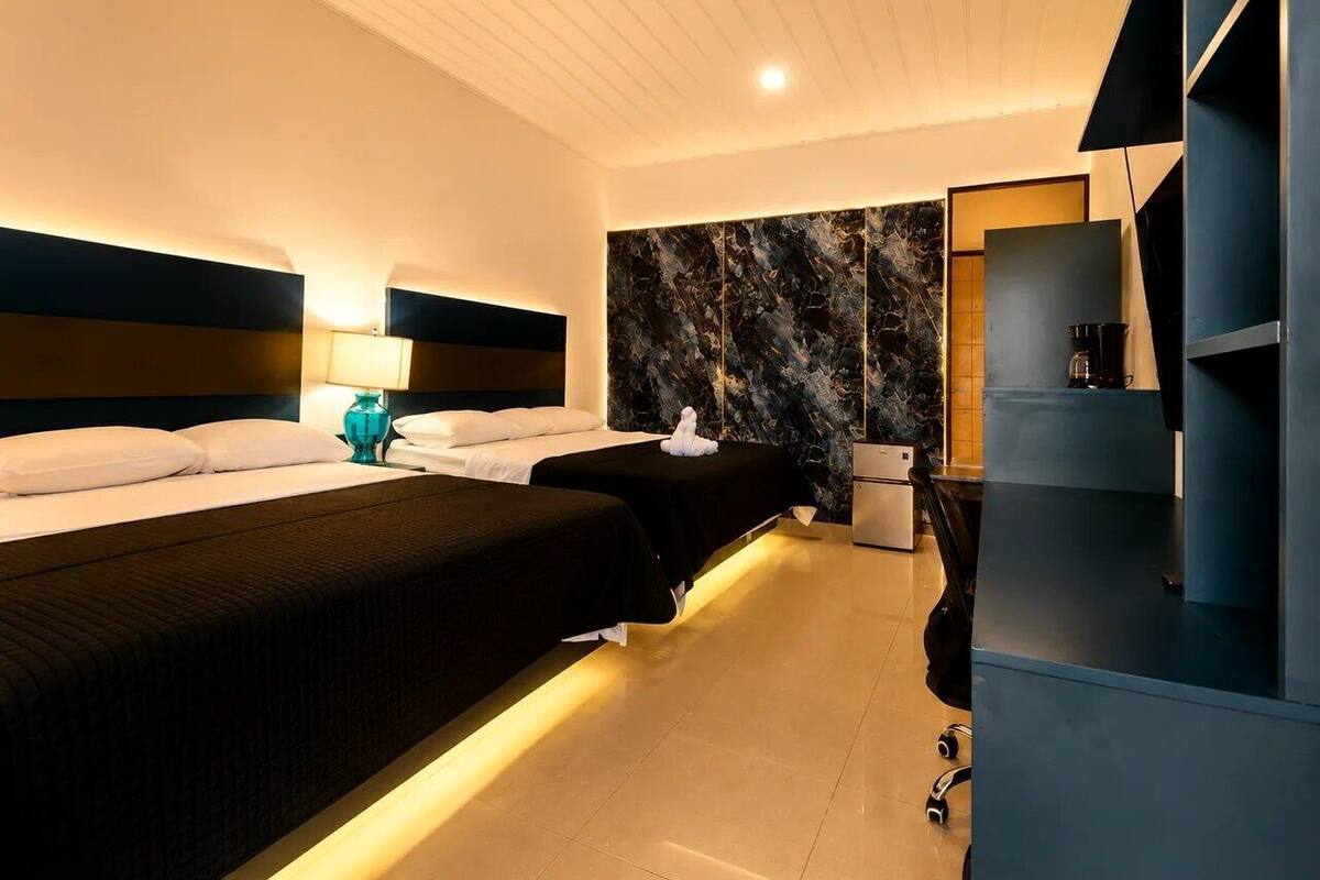 Deluxe Quadruple Room | Blackout curtains, free WiFi