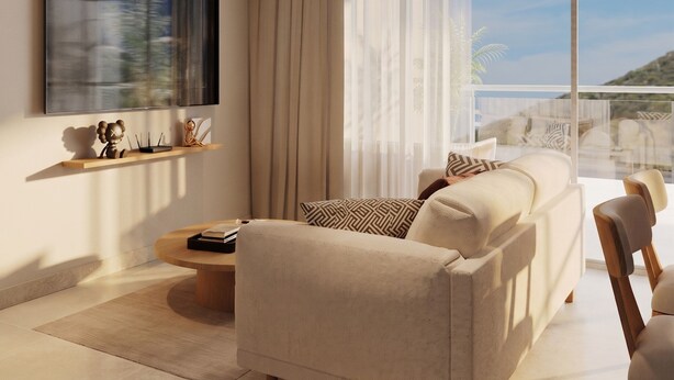 A modern living room with a sofa, a coffee table, and a flat-screen TV mounted on the wall. - Praia Suites by Avia Suites (Santa Marta)