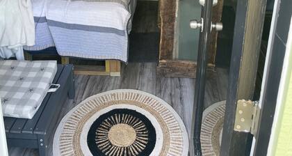 Cozy treehouse ! Close to area lakes !Great kids experience !Or adult ! Fire pit
