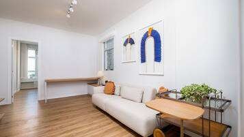 Basic Apartment | Living area | 40-inch TV with digital channels