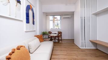 Basic Apartment | Living area | 40-inch TV with digital channels