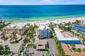 A coastal hotel with a pool, beach access, and a view of the ocean. - Siesta Sands - Unit  208 (Siesta Key)