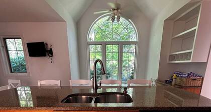 Spacious 5-bedroom with salt water in ground pool surrounded by coastal beaches
