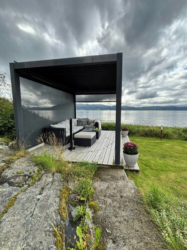 Restored 1950s cabin five metres from the shore