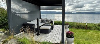 Restored 1950s cabin five metres from the shore