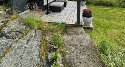 Restored 1950s cabin five metres from the shore