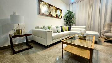 Comfort Condo, Pool View | Living area | 43-inch Smart TV with digital channels