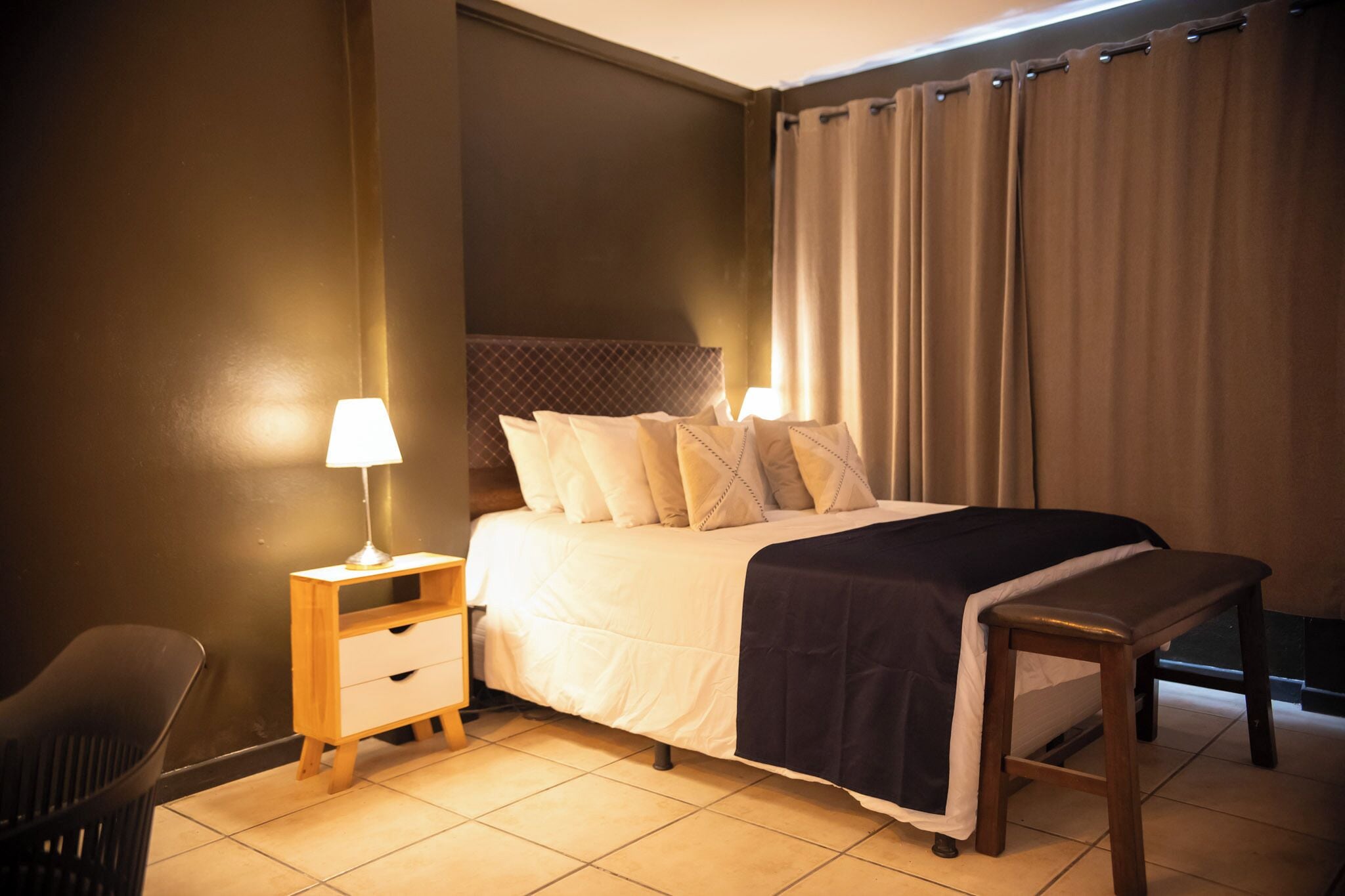 Deluxe Suite | Down comforters, desk, laptop workspace, blackout drapes