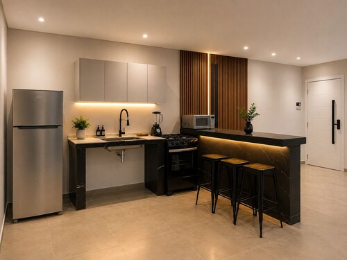 Modern apartment with full resort amenities.