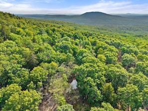 Aerial view - Off grid hike-in Tranquil tipi lodge on mountainside with views (Orland)