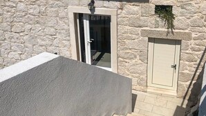 A stone building with a door and a small window. - Lovely home in Zaostrog with house sea view (Zaostrog)