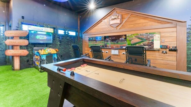 A billiards table with a wooden backdrop and a neon sign. - CampingThemed/Pool/HotTub/GameRoom/FirePit/Sleep16 (Sevierville)