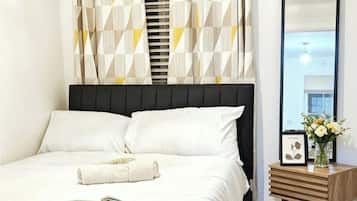3 habitaciones, tabla de planchar con plancha, wifi y ropa de cama