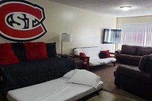 Living area - Husky House! Apt for your group 1.5 mi from Campus (St. Cloud)