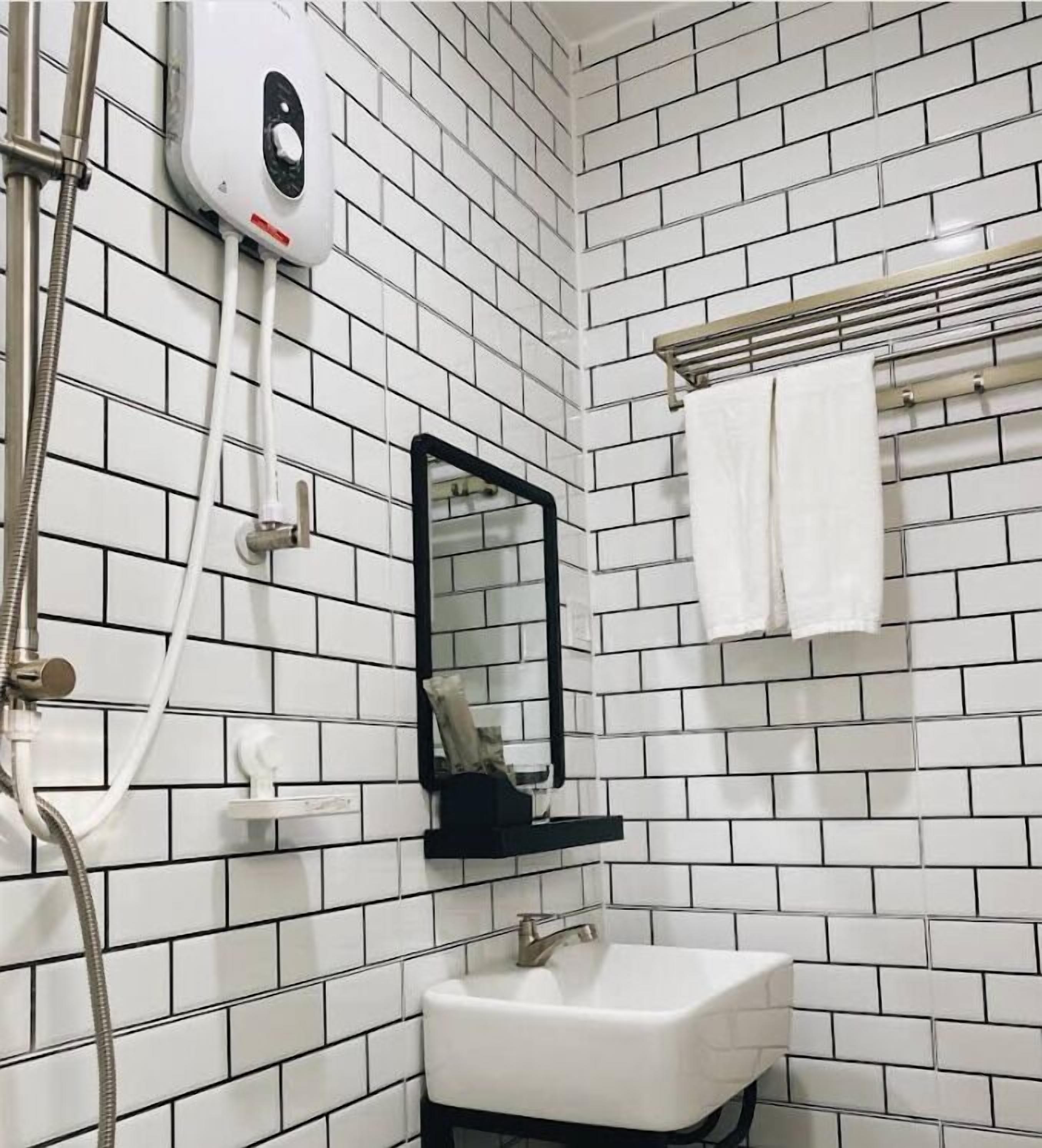 Shower, slippers, towels, soap