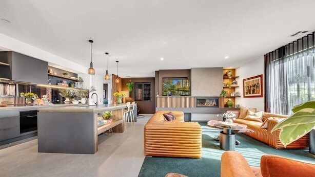 A modern living space with a kitchen, dining area, and seating area. - Coronation Station (Alpine)