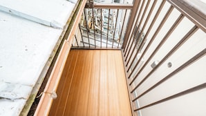 A narrow wooden staircase with metal railings, leading to a higher floor. - Atlantis Tengachaya (Nishinari-ku, Osaka City)