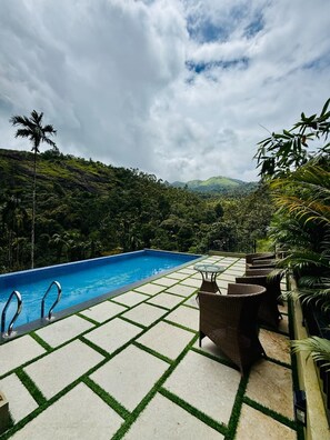 Outdoor pool - Grandlivet Resort (wayanad)