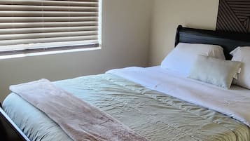 2 dormitorios, tabla de planchar con plancha, wifi gratis y ropa de cama