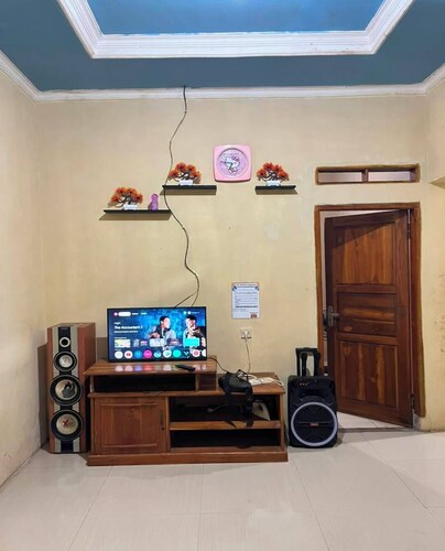 Cozzy Homestay Rain