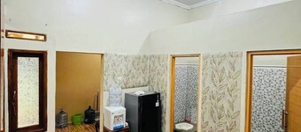 Cozzy Homestay Rain