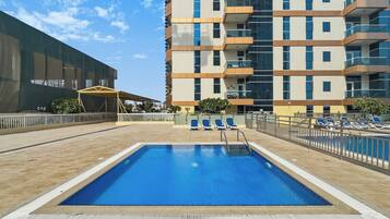 Apartment, Balcony, City View | Pool | Outdoor pool