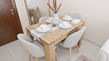 Apartment, Balcony, City View | Dining