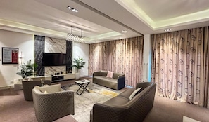 50-inch LED TV with cable channels, Netflix, streaming services - Mac Residence (Lagos)