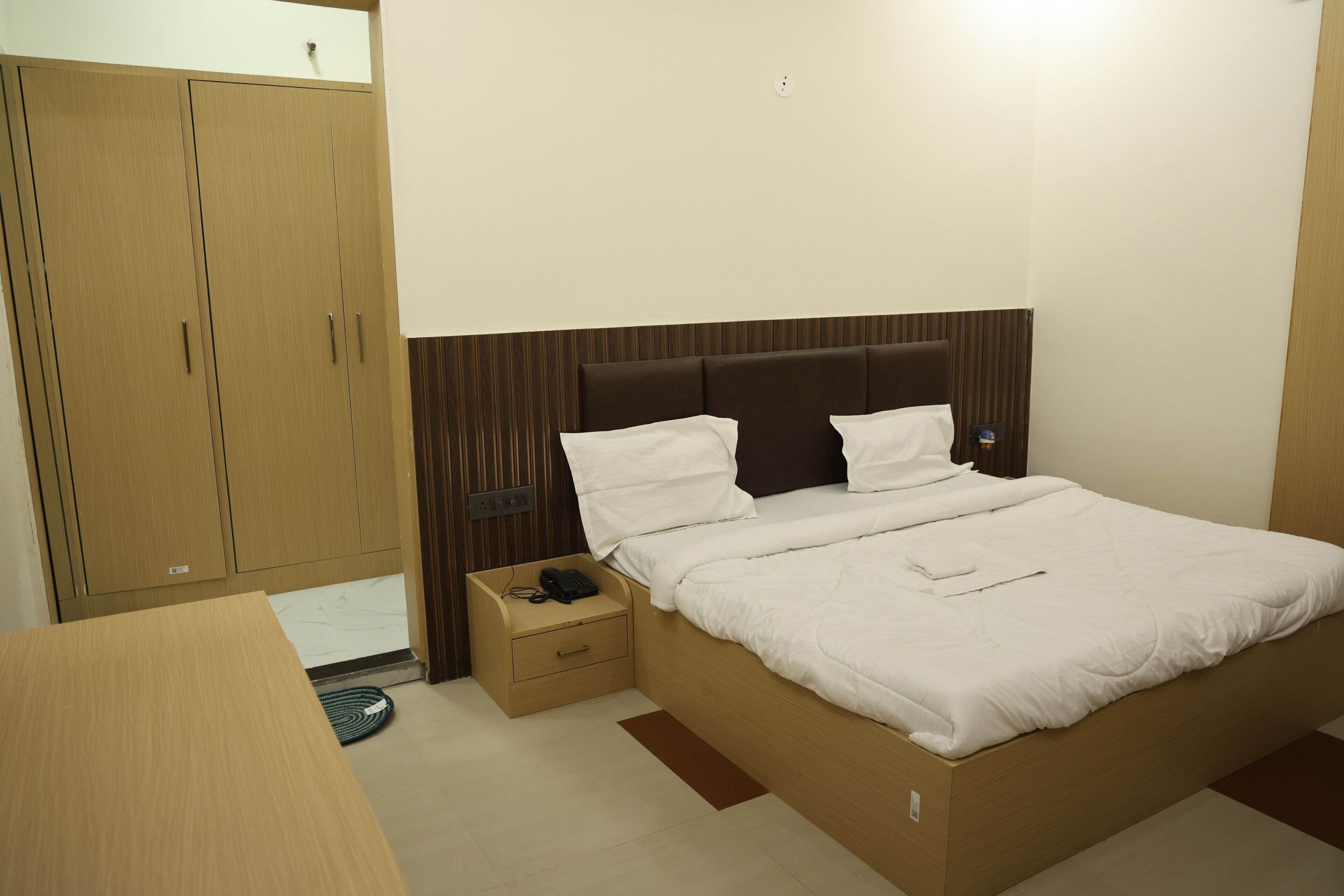 Desk, laptop workspace, free WiFi, bed sheets
