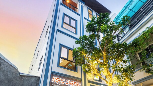 A two-story building with a storefront labeled 'NGOC CHERRY.' - Ngoc Cherry (Hoa Lu)