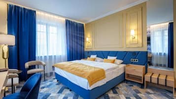 Camera Deluxe con letto matrimoniale o 2 letti singoli | Una cassaforte in camera, una scrivania, Wi-Fi gratuito