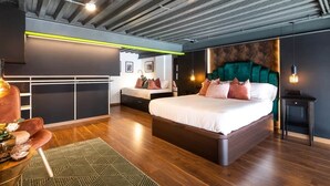 A modern bedroom with a large bed, a sofa, and a desk. - To complete (Valencia)